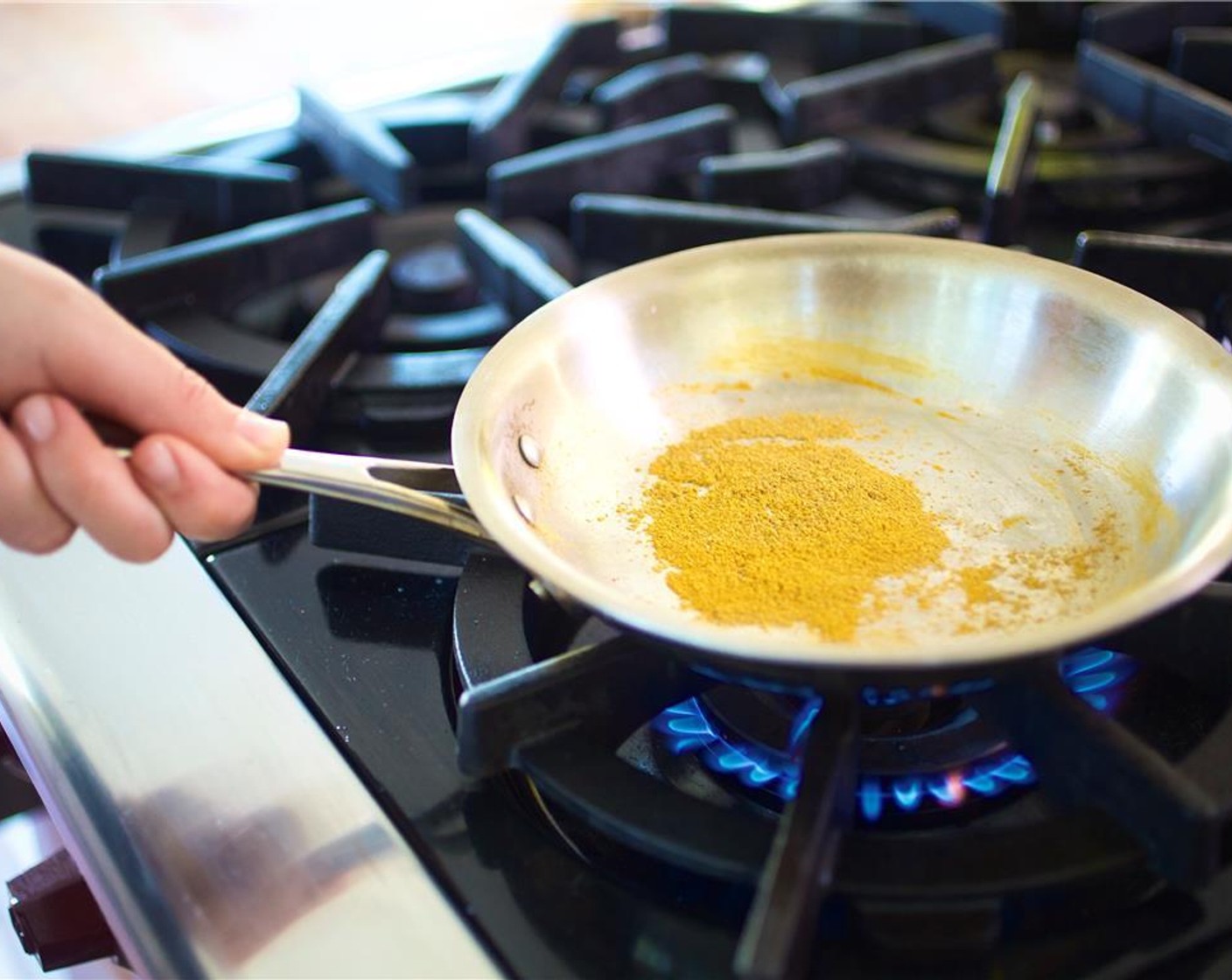 step 7 Dry toast the Ground Cardamom (1/4 tsp), Ground Coriander (1/4 tsp), Ground Cumin (1/4 tsp), and Ground Turmeric (1/4 tsp) in a small saute pan over medium heat. Shake the pan occasionally until the spices become fragrant, about three minutes.