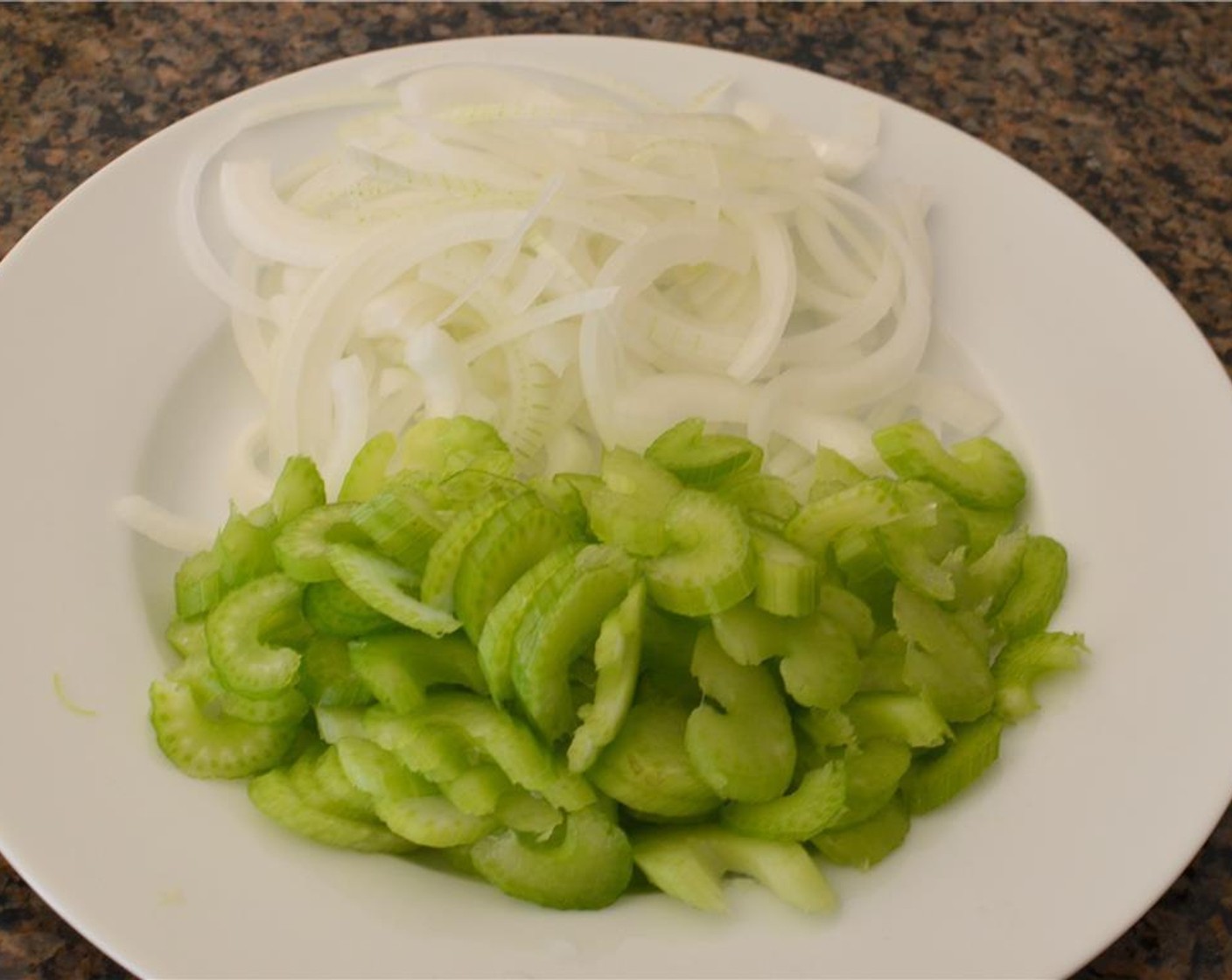 step 3 Slice the Celery (3 stalks) and Onion (1/2) and set aside.