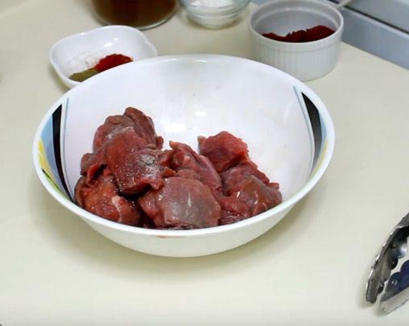 step 1 Cut the Beef Chuck (1 lb) into 2-inch pieces. Season with Salt (to taste) and Ground Black Pepper (to taste).