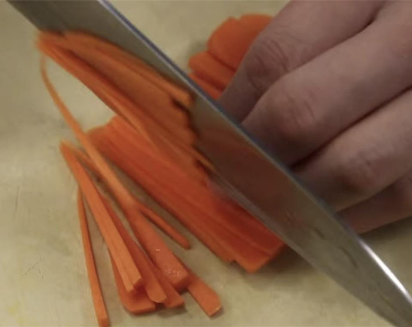 step 8 Take the Carrot (1/3 cup) and slice thinly lengthwise. Cut those thin slices lengthwise to get thin strips.