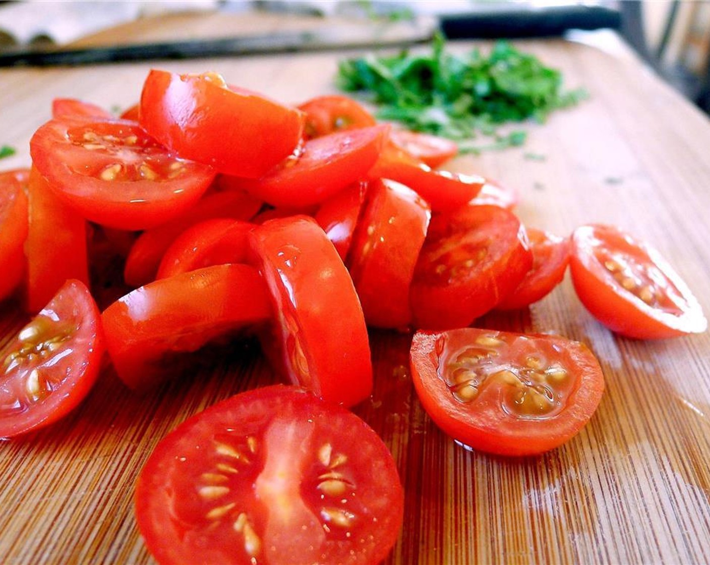 step 9 Chop the Cherry Tomato (1 cup) into bite sized pieces and set aside.