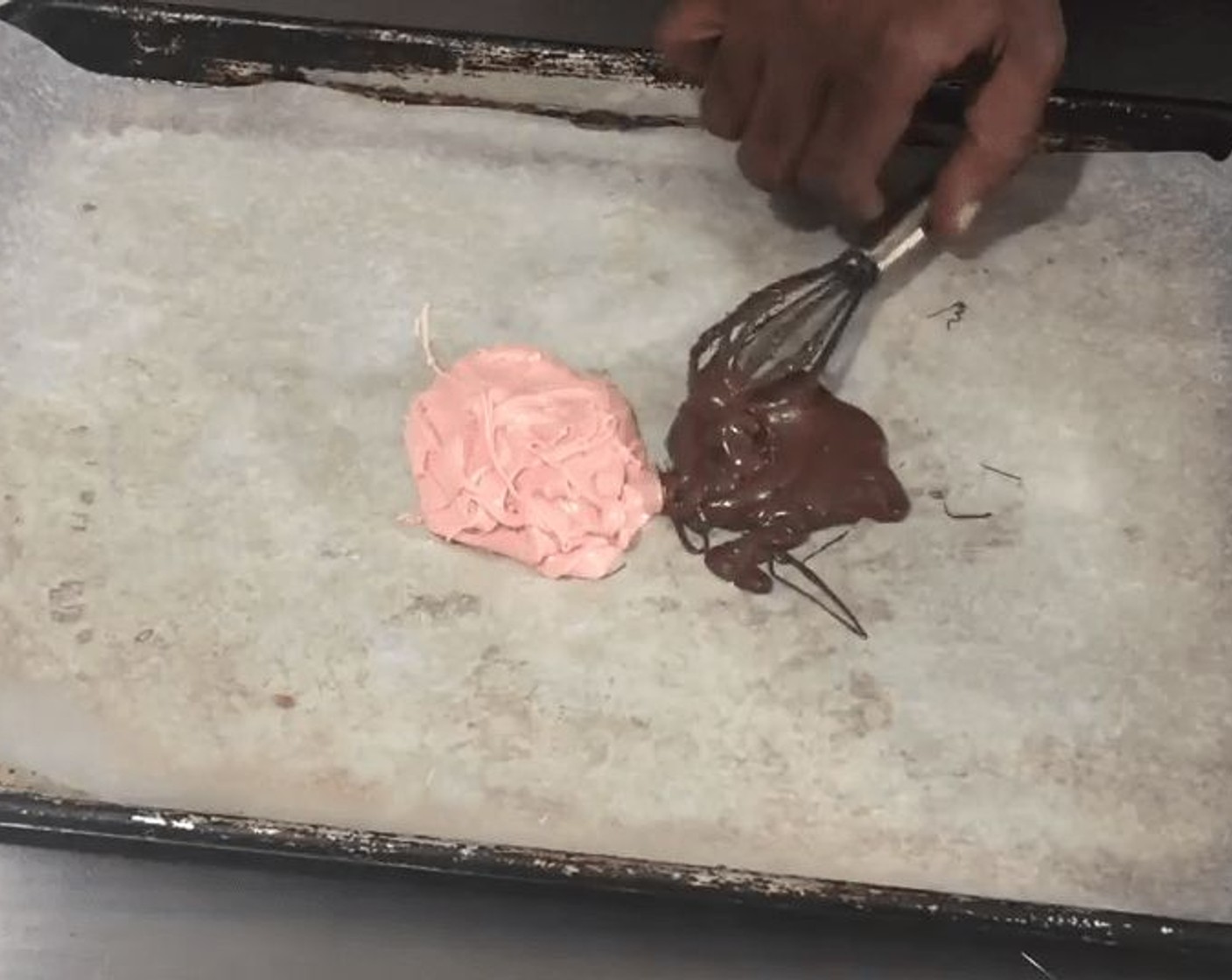 step 16 Pour Semi-Sweet Chocolate Chips (1 cup) and white chocolate mixture onto wax paper.