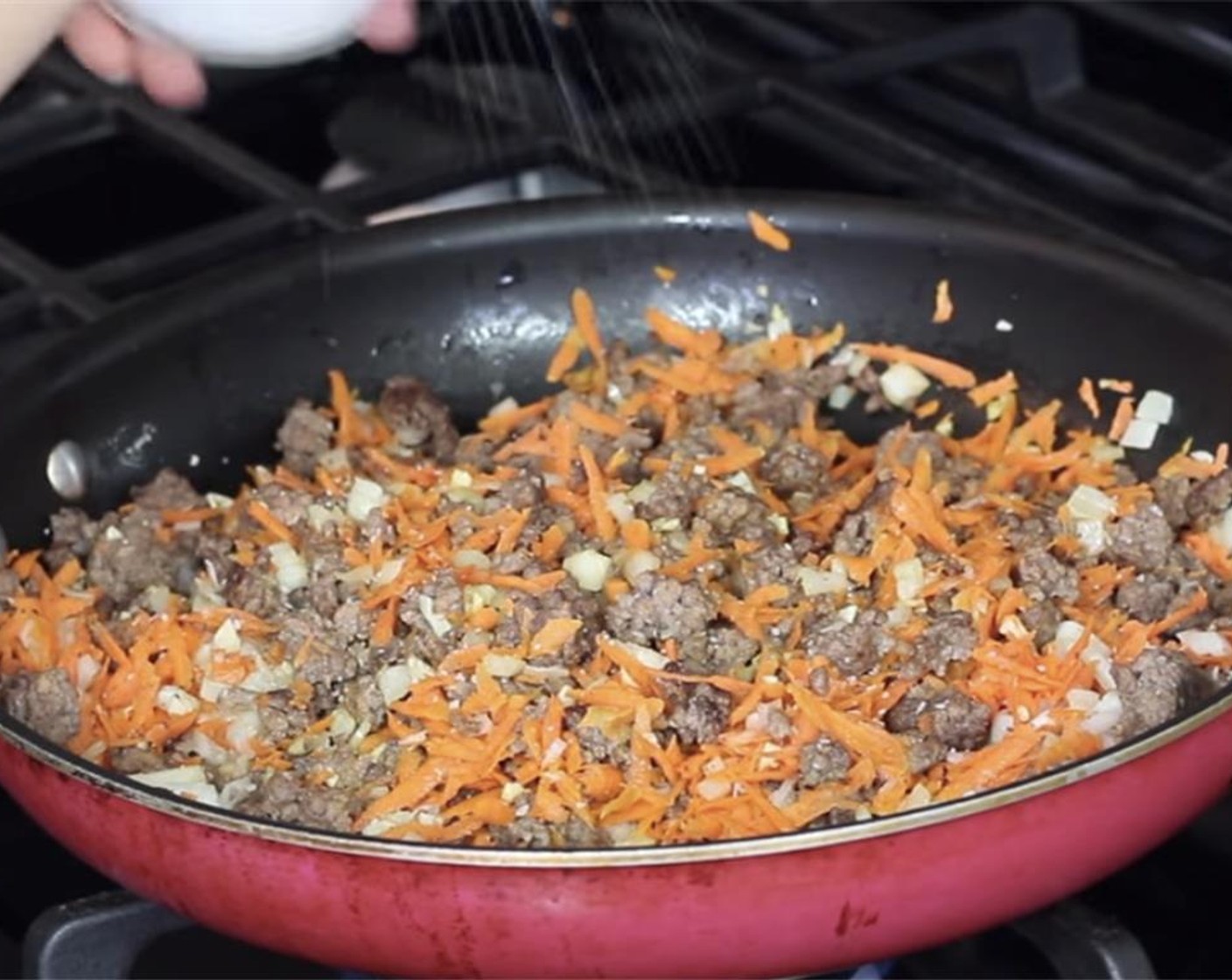 step 9 Add the chopped carrots, onions and garlic. Season with Salt (to taste) and Ground Black Pepper (to taste) and add the Crushed Red Pepper Flakes (1/2 tsp). Cook until vegetables are soft and tender, about 5 minutes.