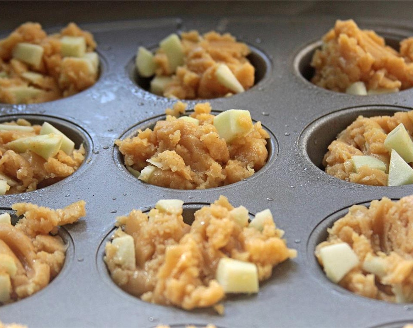 step 9 Fill muffin tins with mixture to just above the top.