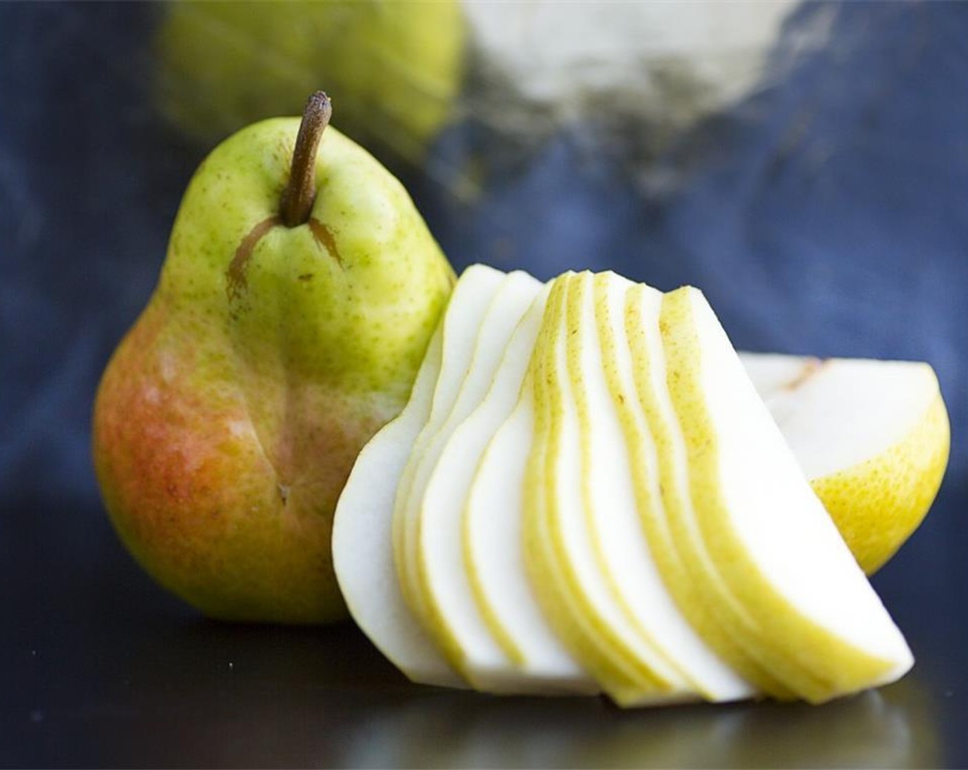 step 3 Cut Pear (1) lengthwise into 15 slices.