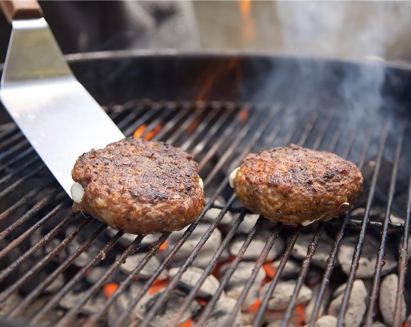 step 13 Place the patties on the grill and cook on each side for about 7 minutes, or until desired temperature.