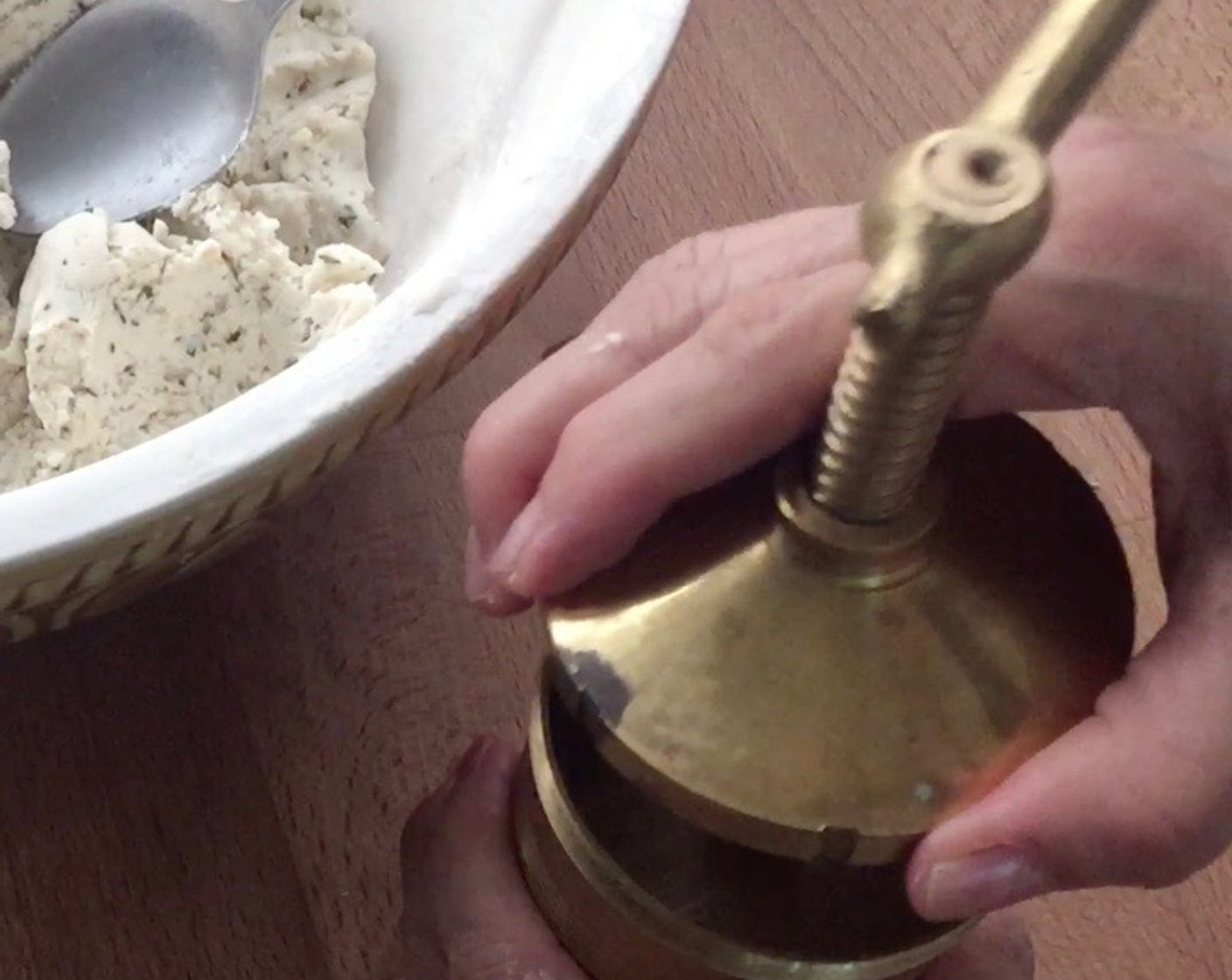 step 10 Then fill the murukku press with a portion of the dough and press the dough through the press from the top. You can use any mould for this purpose and you can do this two ways.