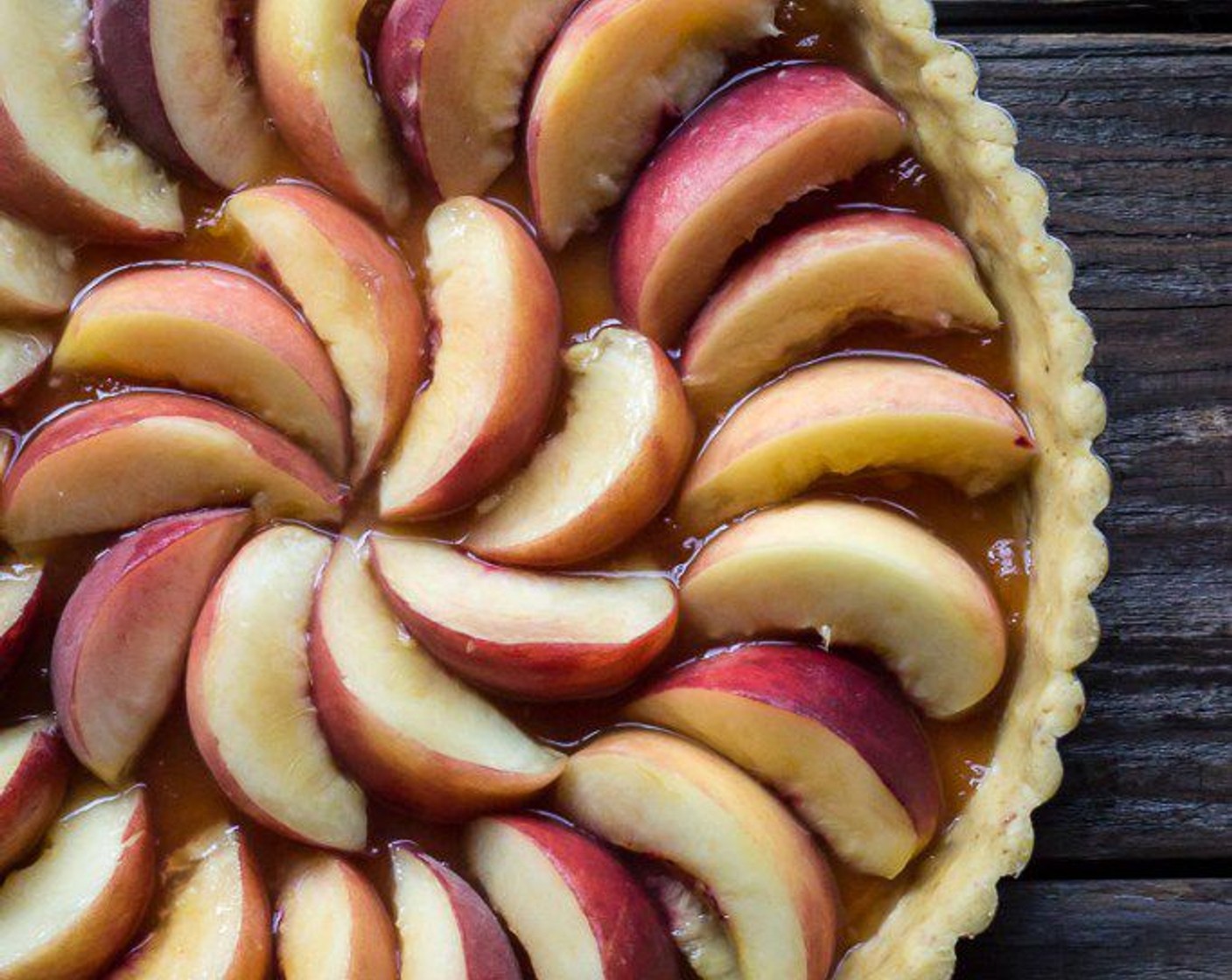 step 8 Lay White Peaches (3) atop the jam-filled crust in concentric circles.