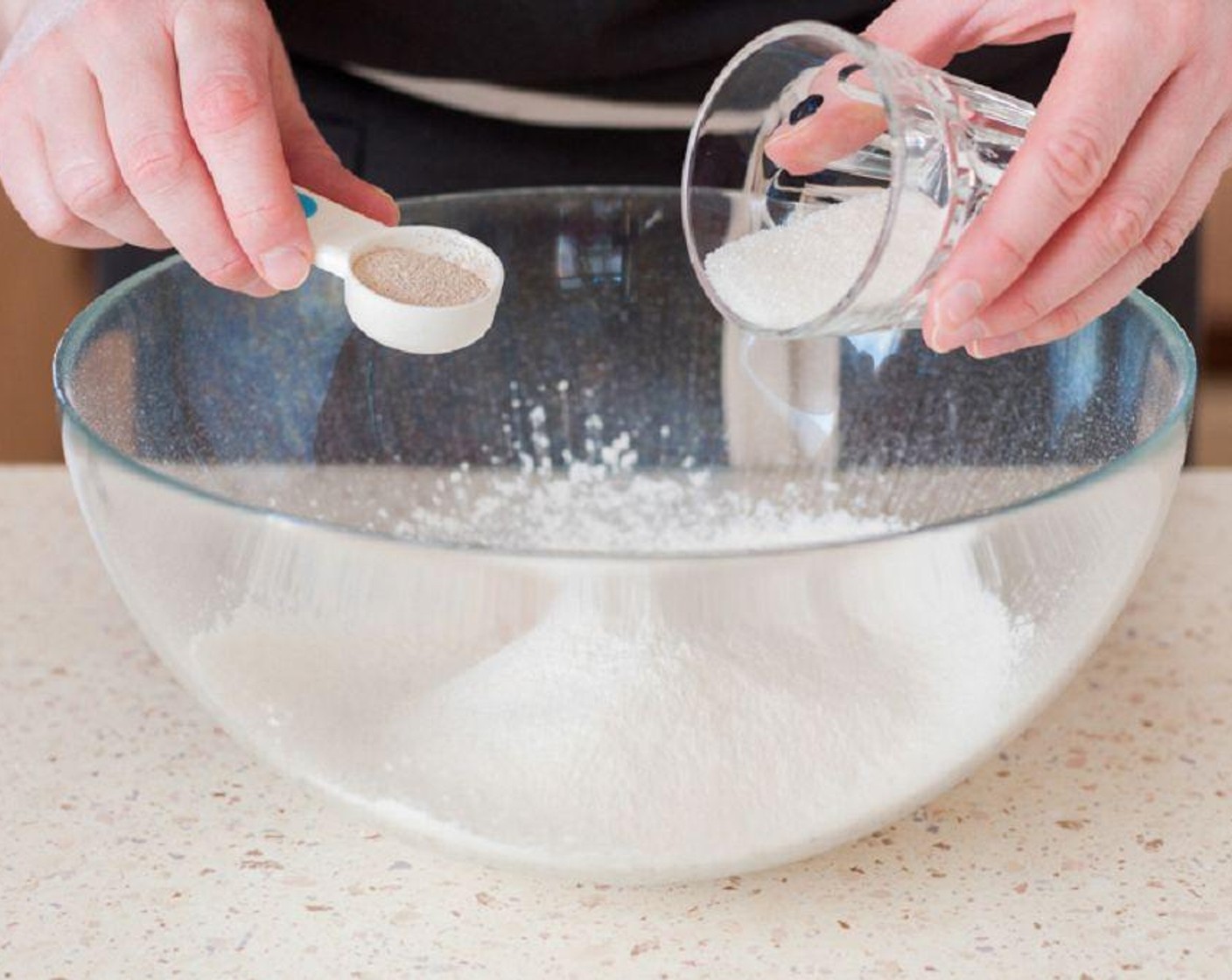 step 1 Whisk Milk (2 cups) and an additional 2 tablespoons of milk together with the Eggs (6), Active Dry Yeast (1 Tbsp), Granulated Sugar (2 cups), melted Unsalted Butter (1 cup), Salt (1/2 tsp), Sour Cream (1/2 cup), and Vanilla Extract (1 tsp) in one large mixing bowl.
