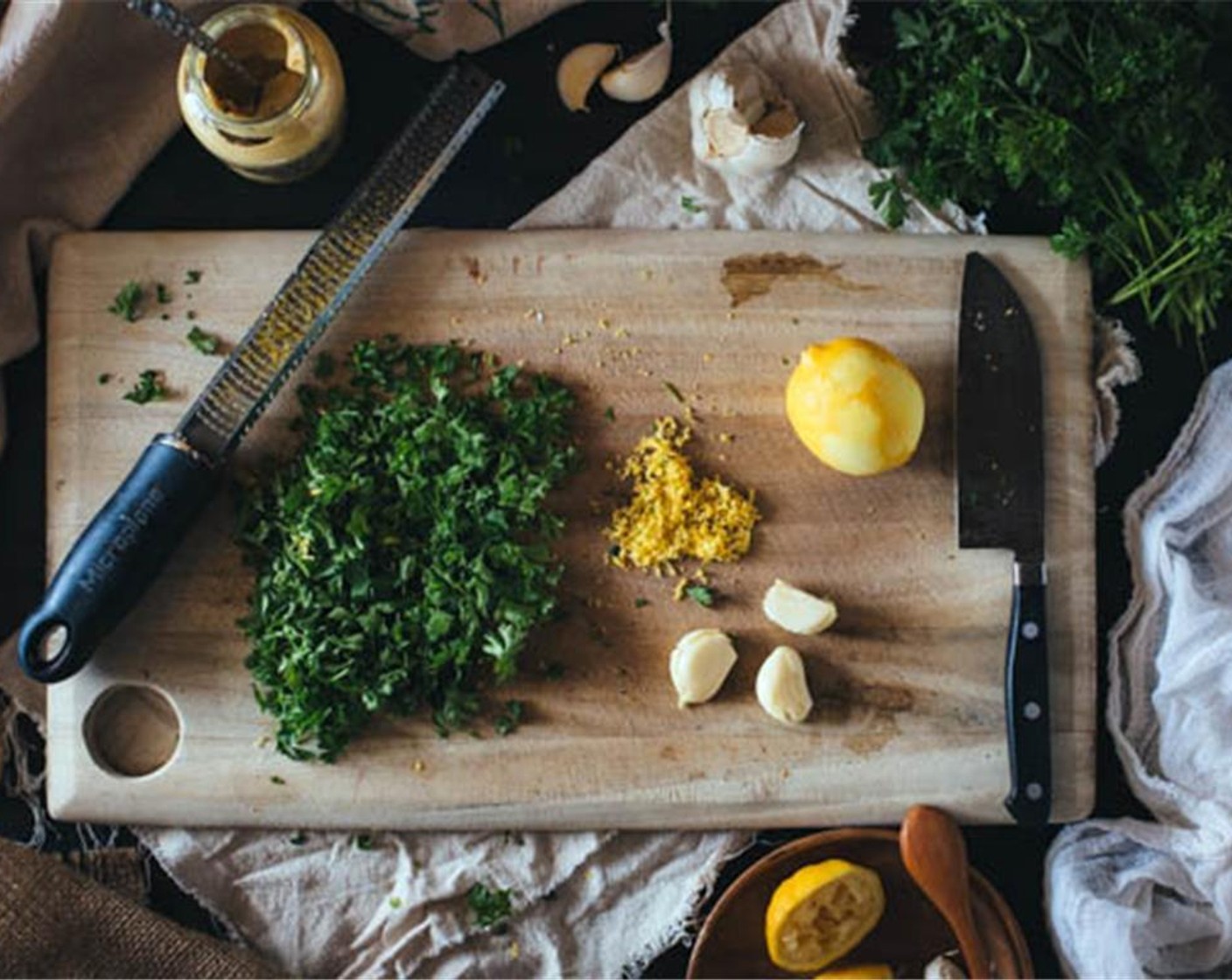 step 8 Finely chop the Italian Flat-Leaf Parsley (1/2 cup). Mince the Garlic (2 cloves).