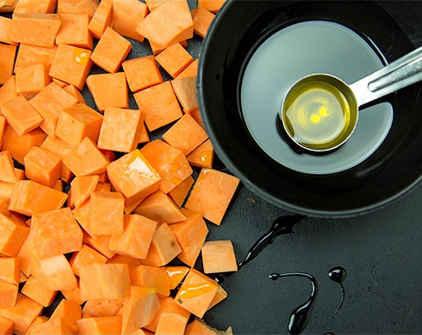step 2 Place the sweet potato chunks into a mixing bowl. Drizzle with Olive Oil (3 Tbsp).
