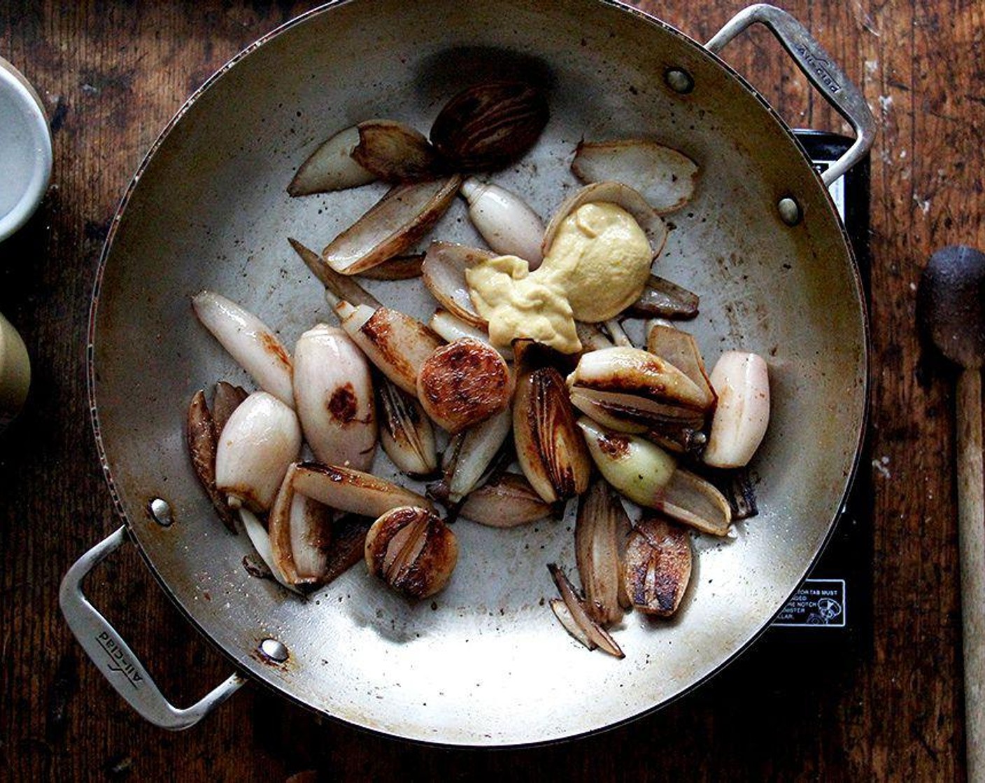 step 3 Add the Dijon Mustard (2 Tbsp) and Tarragon (3 sprigs) and stir until the mustard coats the shallots evenly and begins to brown.