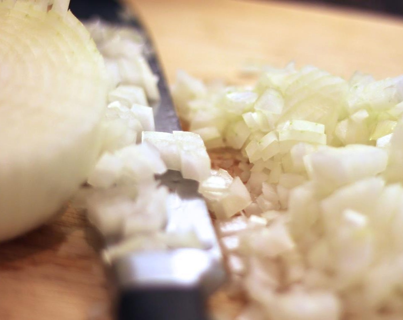 step 1 Dice the Yellow Onion (1), Tomatoes (2) and finely chop the Garlic (4 cloves).