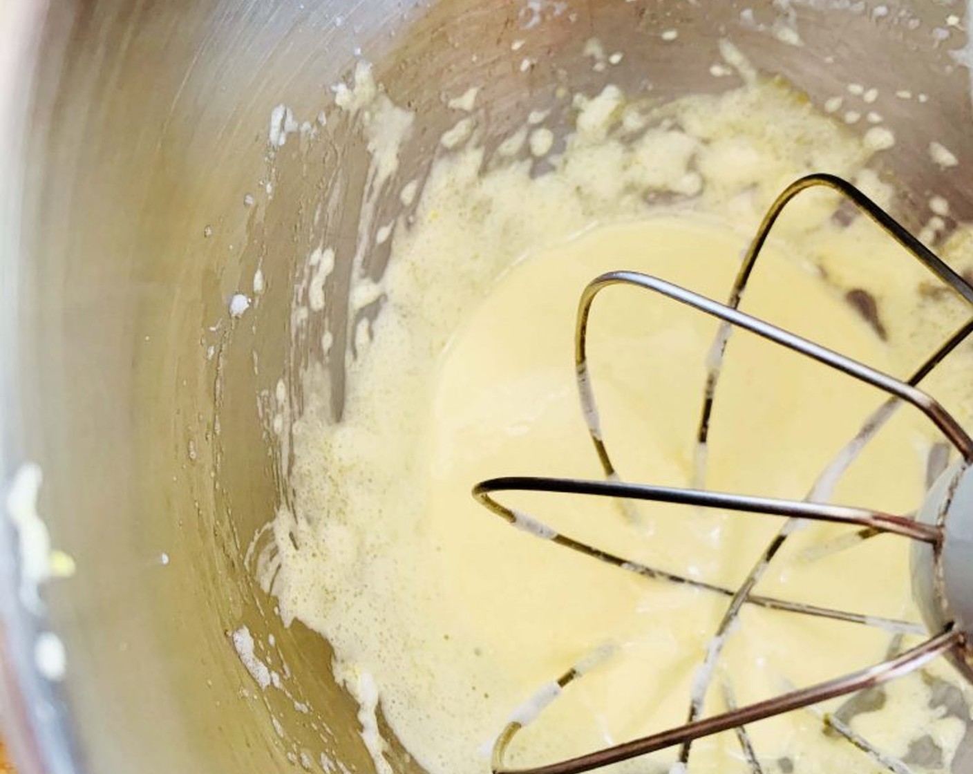 step 2 In a separate bowl whisk egg yolks, Granulated Sugar (1/3 cup), and Orgeat Almond Syrup (3 Tbsp) until light in color and foamy.