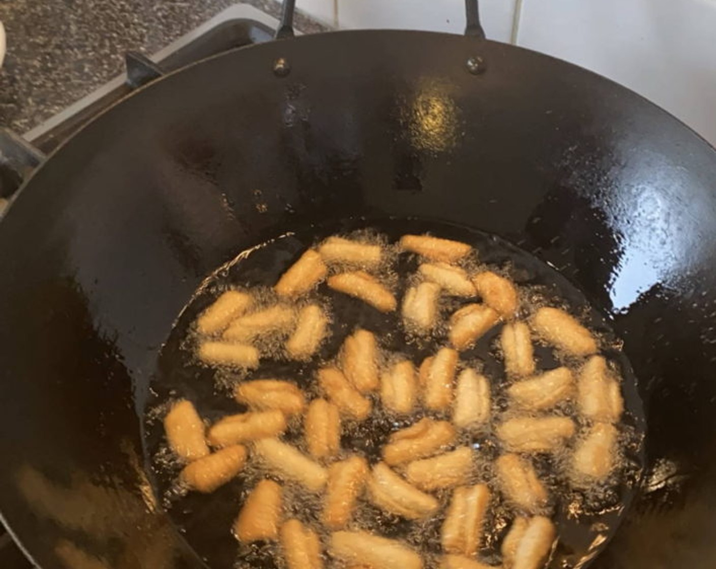 step 9 Fry a handful of kulkuls at a time. You want then to turn a golden brown. This should take about 3-4 minutes. Drain well on plates lined with paper towels.