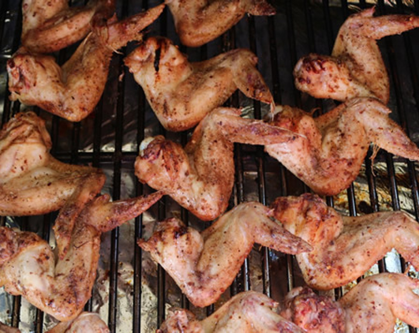 step 7 Place wings on the grill and smoke for 45 minutes.