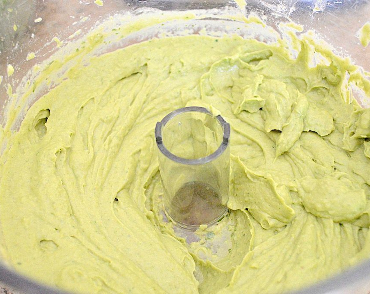 step 2 While the water comes to a boil and the pasta cooks, make the sauce. Combine the Avocados (3), Fresh Baby Spinach (1/2 cup), Shallot (1), Garlic (2 cloves), Salt (1 pinch), Crushed Red Pepper Flakes (1 pinch) and Lime (1), a food processor and run it until it becomes smooth and creamy.