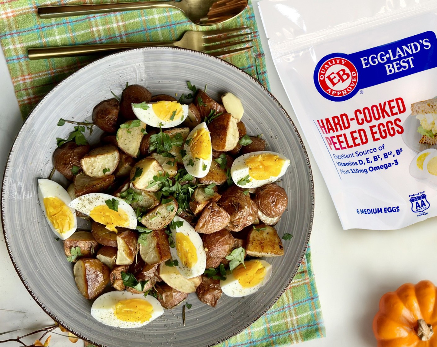 step 5 In a large plate - add potatoes and Eggland's Best Hard Cooked Eggs (4) top with Fresh Parsley (to taste).