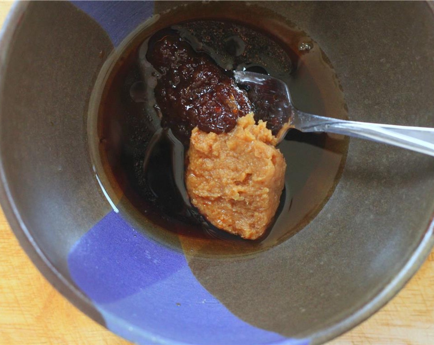 step 3 In a medium bowl mix together the Dark Molasses (2 Tbsp), Low-Sodium Soy Sauce (2 Tbsp), Chili Paste (1 Tbsp), Miso Paste (1 Tbsp) and Sesame Oil (1 Tbsp).