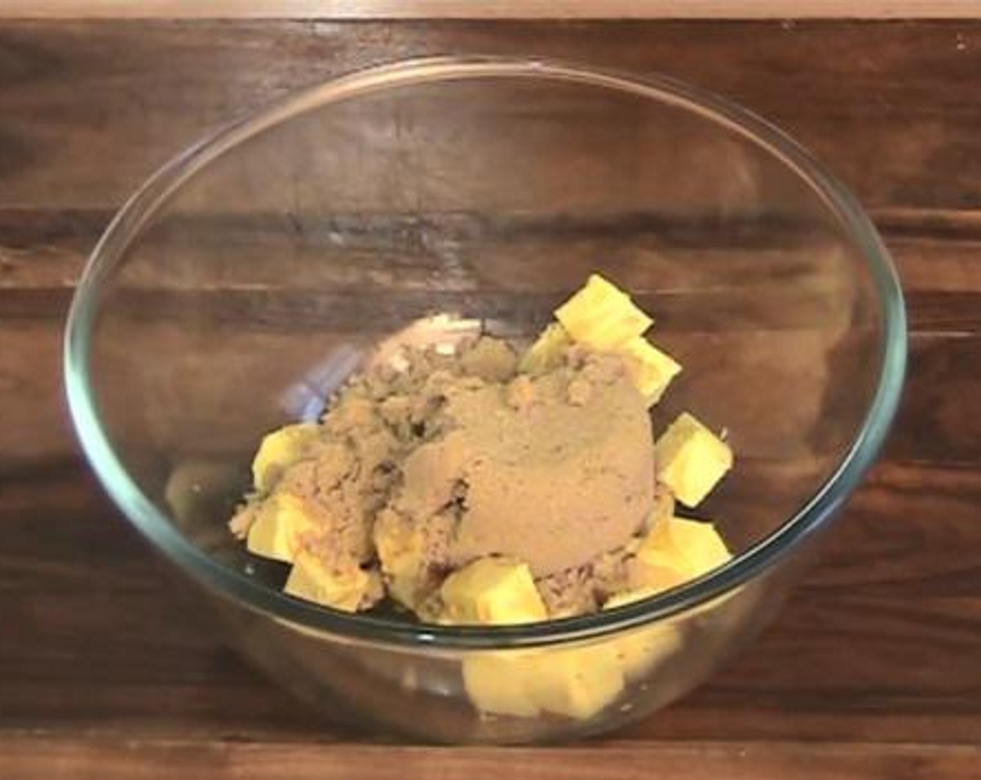 step 1 Into a mixing bowl, add and mix the Butter (4.5 oz), Vanilla Extract (1 tsp), Golden Syrup (1 Tbsp), and Brown Sugar (1/2 cup).