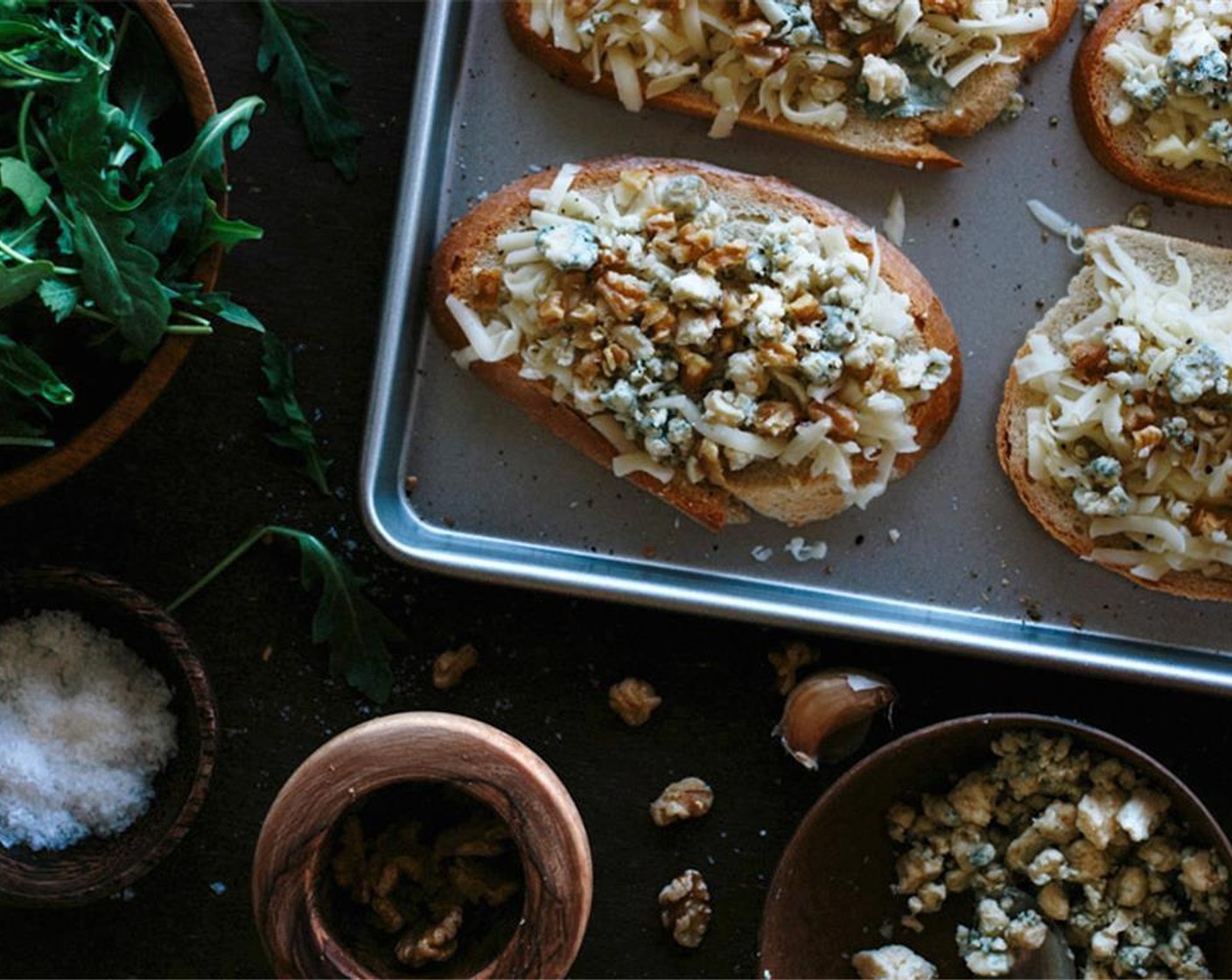 step 4 Place baking sheets in the oven and bake them for 10-12 minutes, or until the cheese is melted.