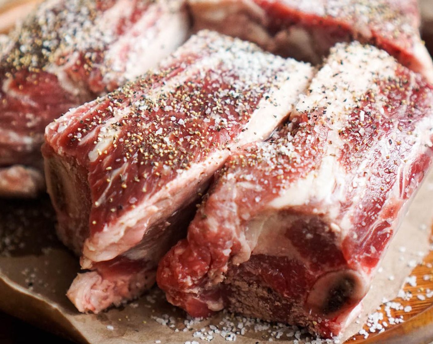 step 2 Season the Beef Short Ribs (6) heavily on all sides with Kosher Salt (to taste) and Freshly Ground Black Pepper (to taste).