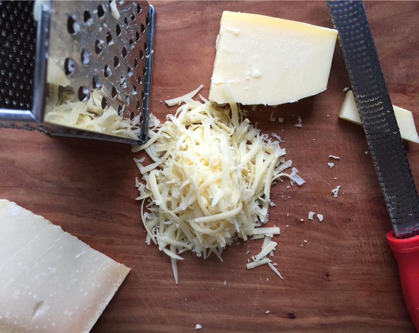 step 14 Prepare the Parmesan Cheese (1/2 cup) using a microplane, and use a box grater for the Gruyère Cheese (1/2 cup).