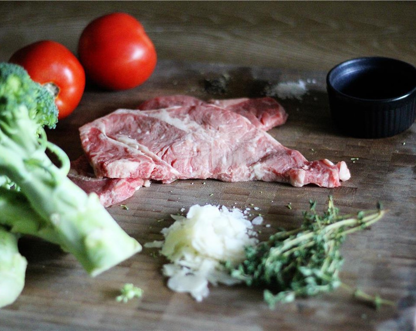 step 3 Chop the Tomatoes (2) and set aside, then sprinkle each Steak (4 oz) with Salt (to taste) and Ground Black Pepper (to taste) on each side.