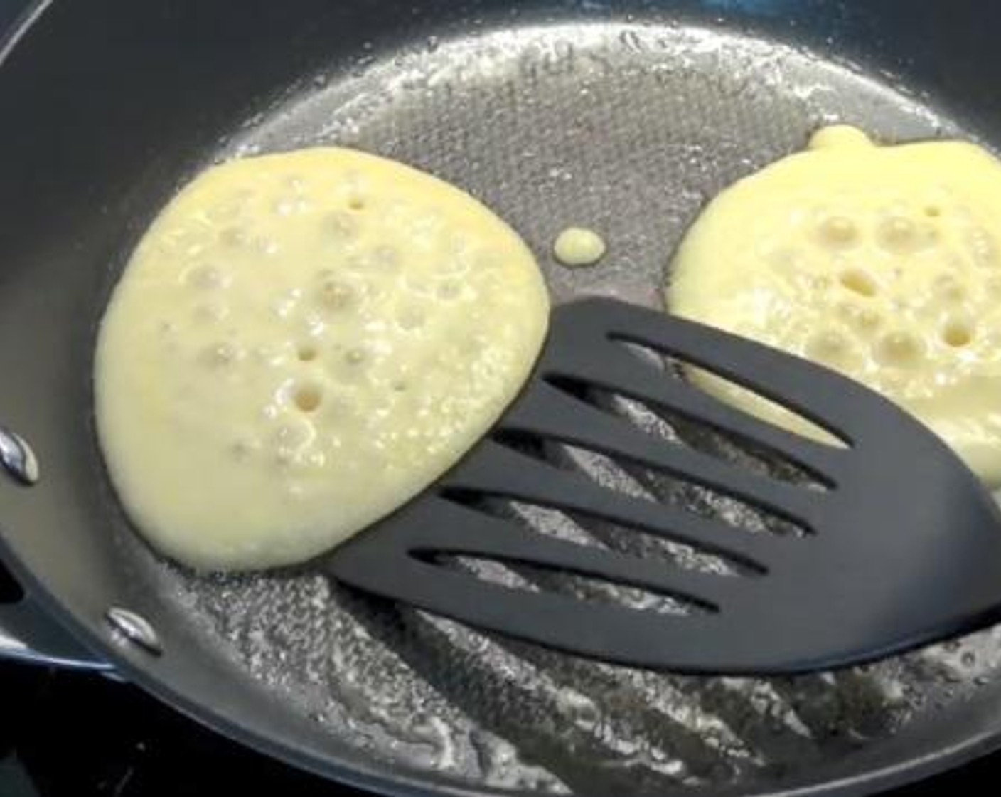 step 3 Put the batter on a greased frying pan over medium heat, and cook on both sides.