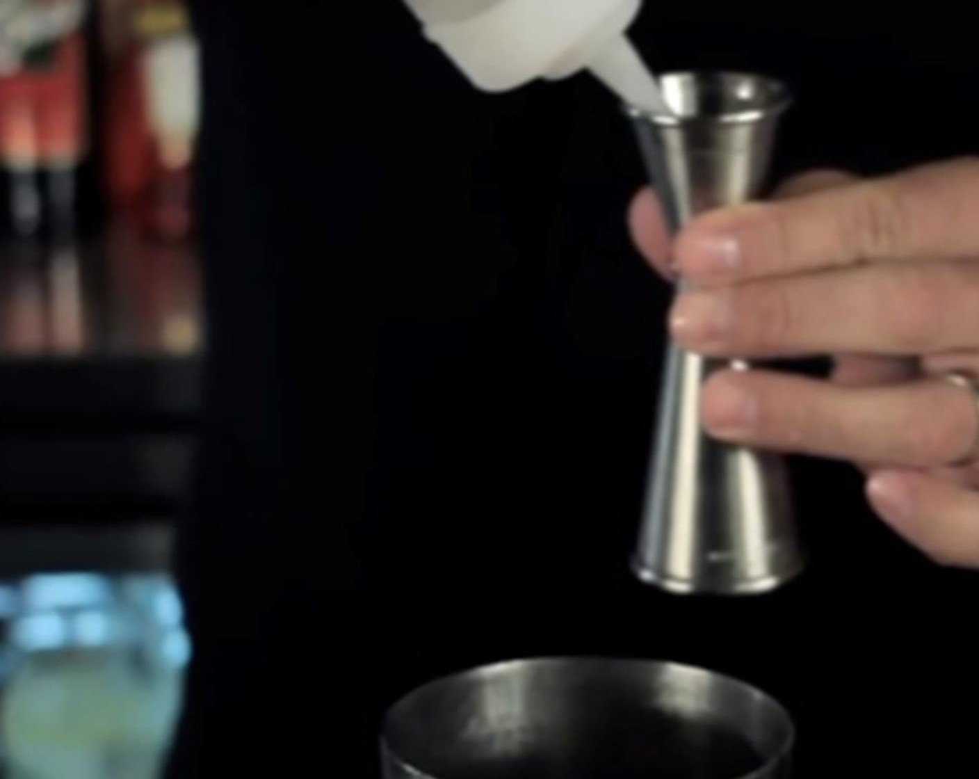 step 1 In a cocktail shaker pour VEEV® Spirit (2 fl oz), 0.75 fluid ounces of Lemon Juice (1), and Simple Syrup (0.8 fl oz) over Ice (as needed), and shake.
