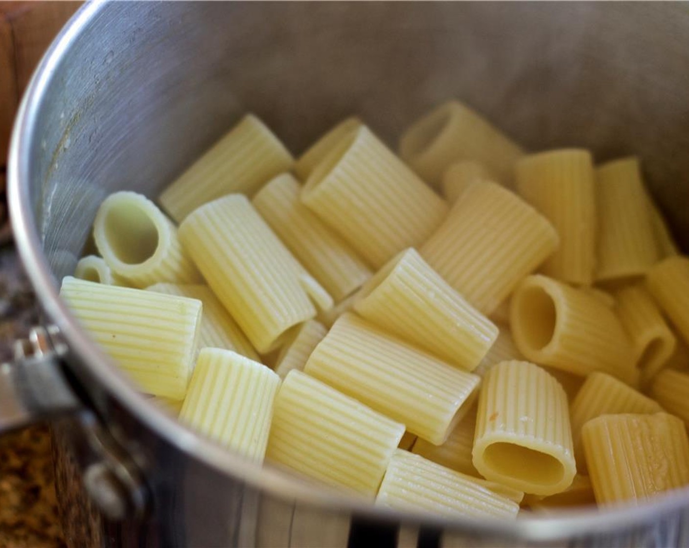 step 6 While the sauce cooks, prepare the Pasta (1 pckg) according to package's instructions.