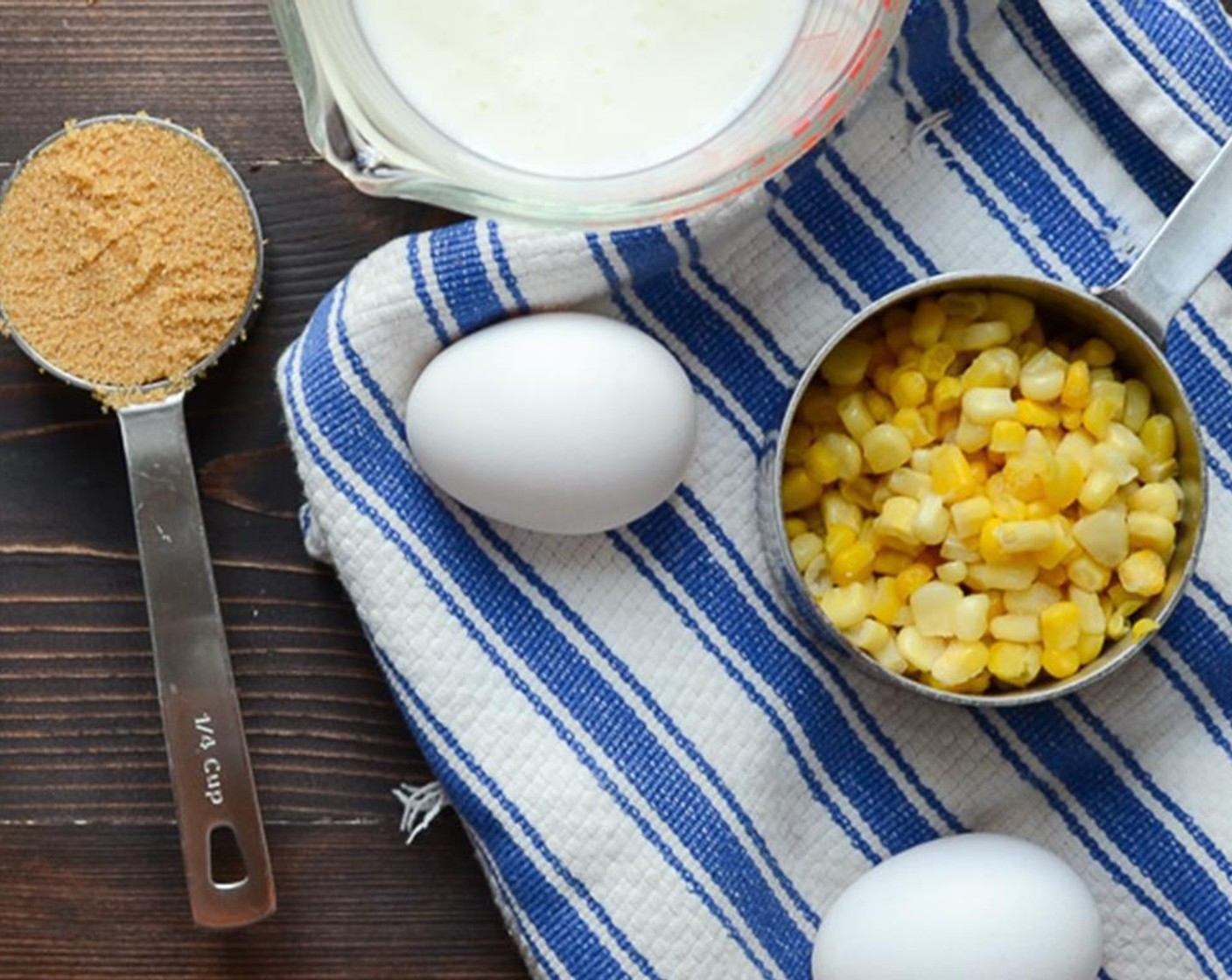 step 3 Prepare a square or round 9-inch cake pan (glass or metal) by spraying it liberally with vegetable spray. Set aside. Melt the Unsalted Butter (1/2 cup) in the microwave, and set aside to cool.