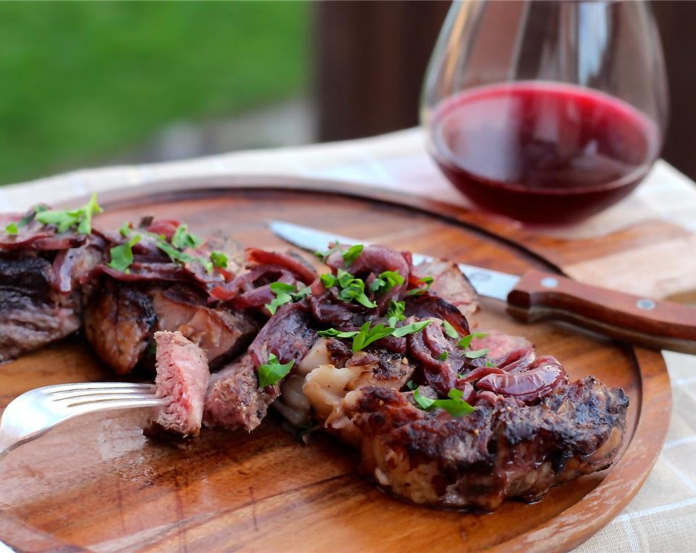 step 11 Slice the steaks against the grain, and sauce with the Cabernet butter onion sauce. Enjoy!