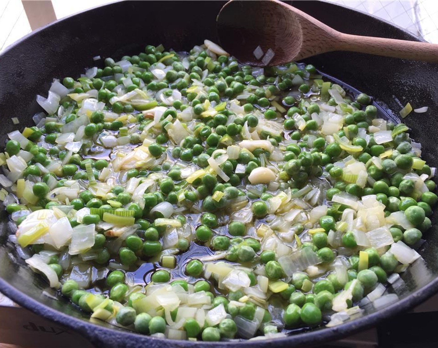 step 6 Add the English Peas (1 1/2 cups), Kosher Salt (to taste), and Freshly Ground Black Pepper (to taste). Cook until soft.