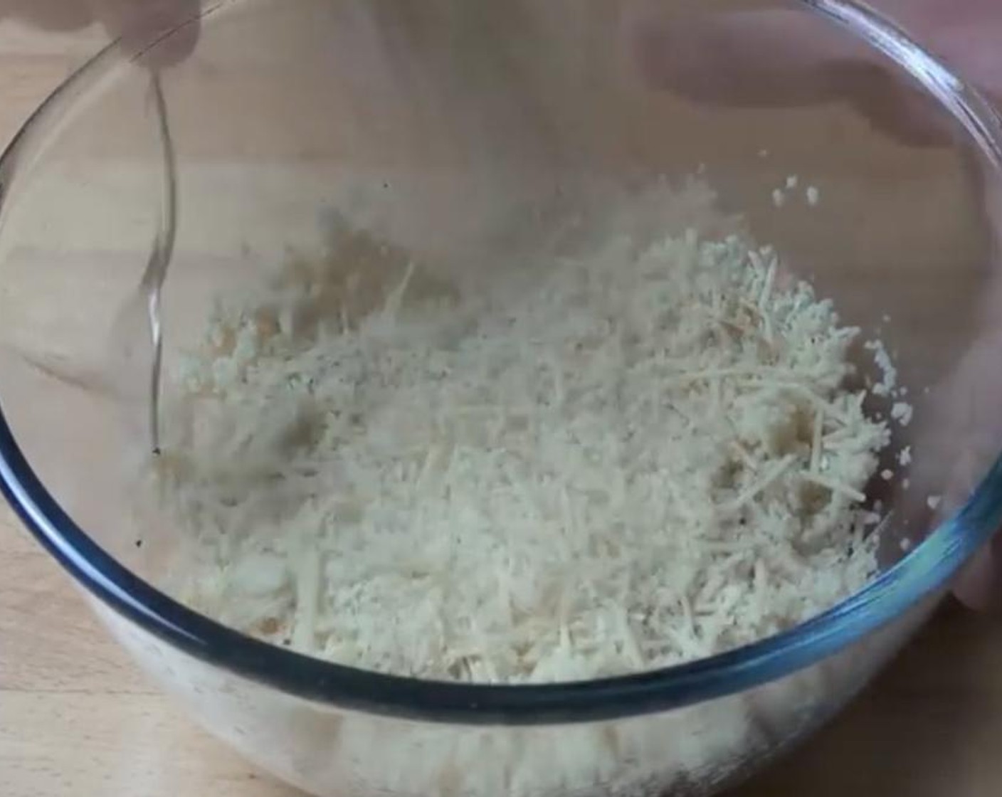 step 4 Add in the Parmesan Cheese (1/2 cup) to the couscous mixture. Then toss everything together and move the mixture onto a plate.