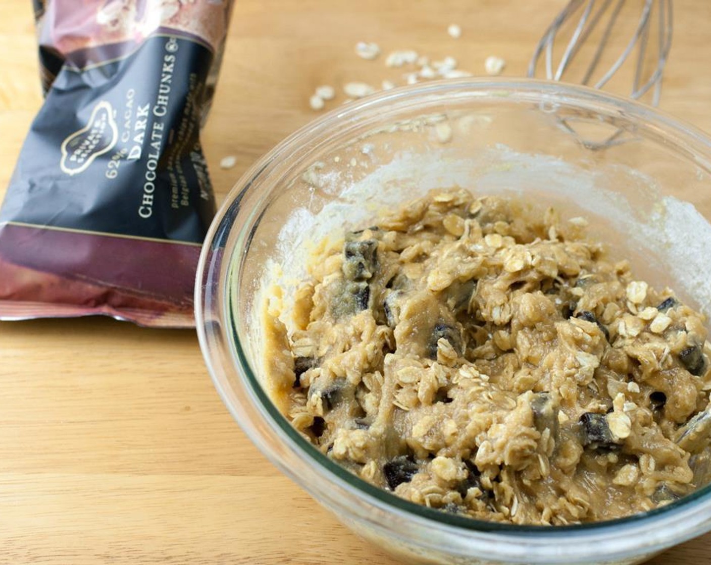 step 5 Add in the Old Fashioned Rolled Oats (1 cup) and the Vegan Dark Chocolate Chunks (1/2 cup) to the dough and stir until just combined. Be sure to not overmix it!