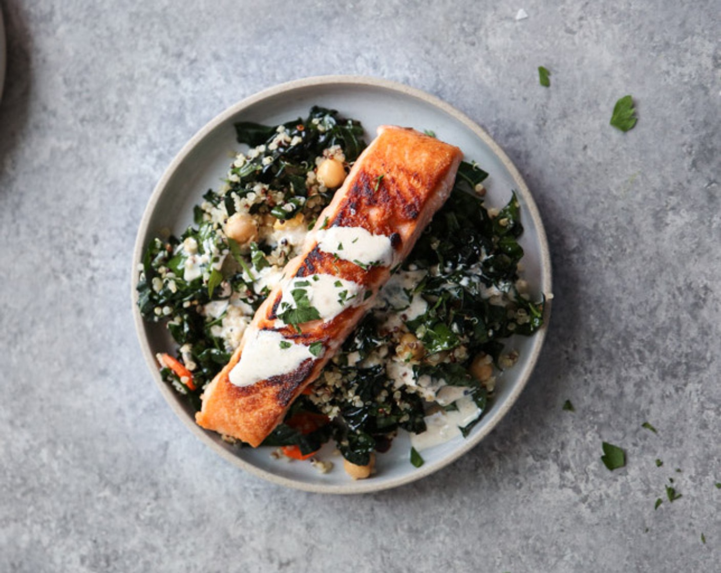 Salmon and Quinoa Bowl with Kale and Tahini Sauce