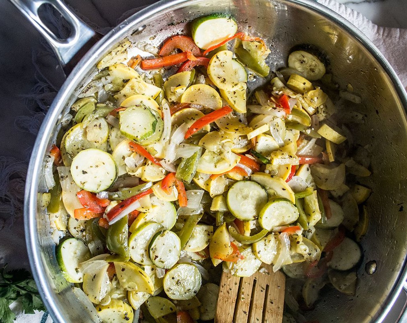 step 3 Add Carrot (1/2 cup), Green Bell Pepper (1/2), Red Bell Pepper (1/2), Yellow Squash (1), Zucchini (1), and Sweet Onion (1) to a large skillet, pour dressing over veggies and stir to coat. Cook over medium heat for 10-12 minutes or until vegetables are tender and cooked to your preference.