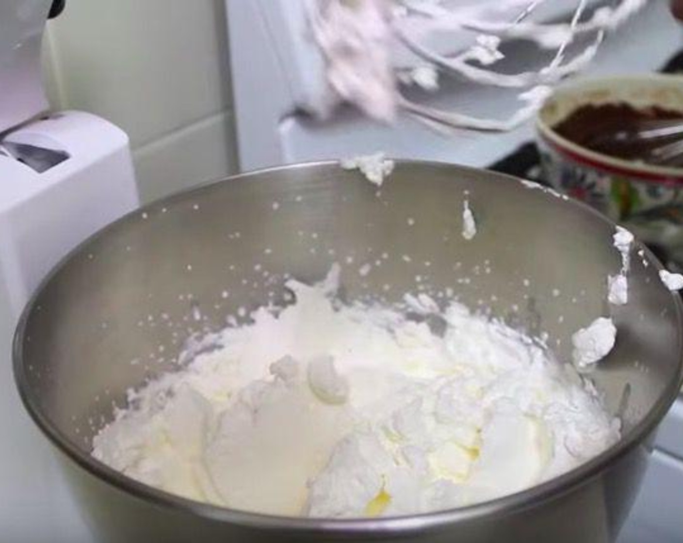 step 1 Add Sweetened Condensed Milk (1 1/3 cups), Unsweetened Cocoa Powder (1/2 cup) into a large mixing bowl and mix it together. Set aside. Add Heavy Cream (2 cups) into a beater and whisk until it foam up and put it in a bowl.