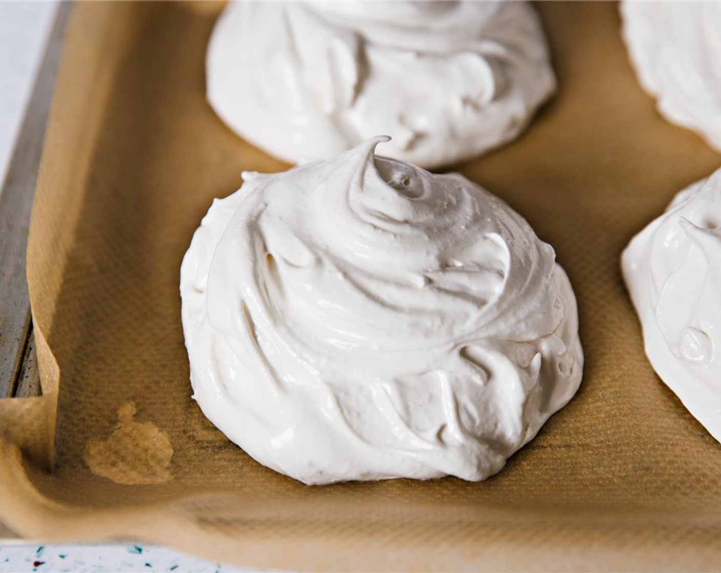 step 8 Spoon mixture onto prepared tray, and bake at 200 degrees C (400 degrees F) for 10 minutes.