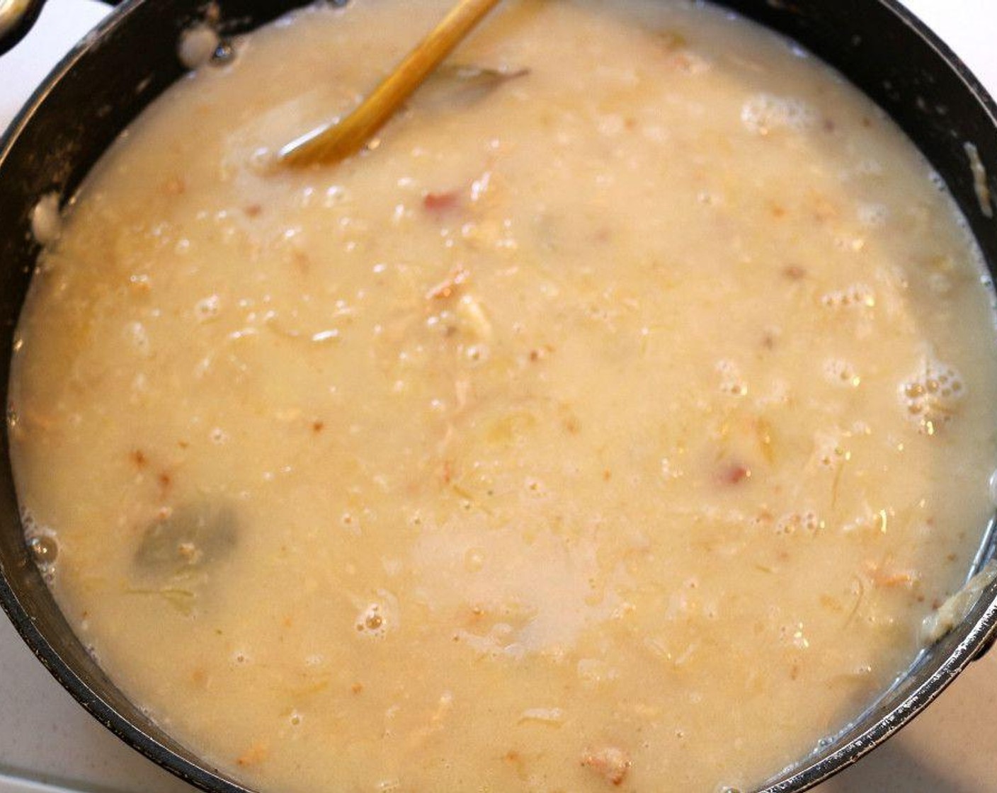 step 4 Add Pork Broth (8 cups) and bring to a simmer. Simmer for 20 minutes and, if necessary, adjust texture of soup during this time.