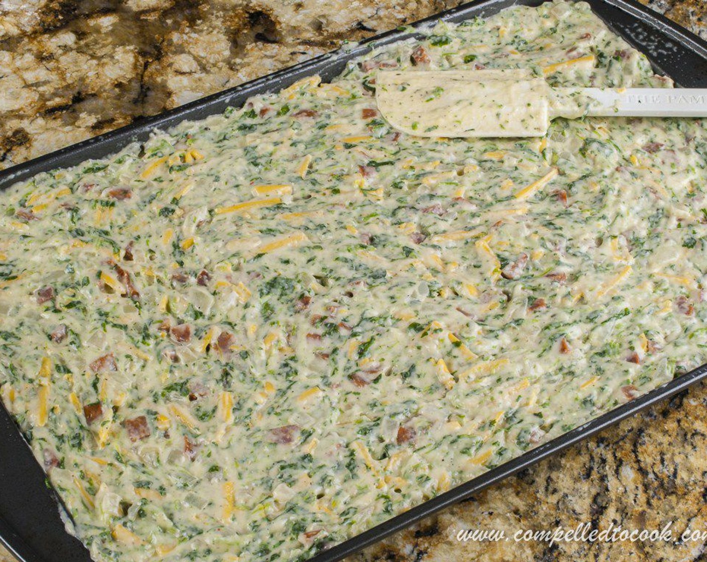 step 7 Spread evenly onto a parchment lined 15x10-inch baking sheet. Bake for 25-30 minutes until center is set.