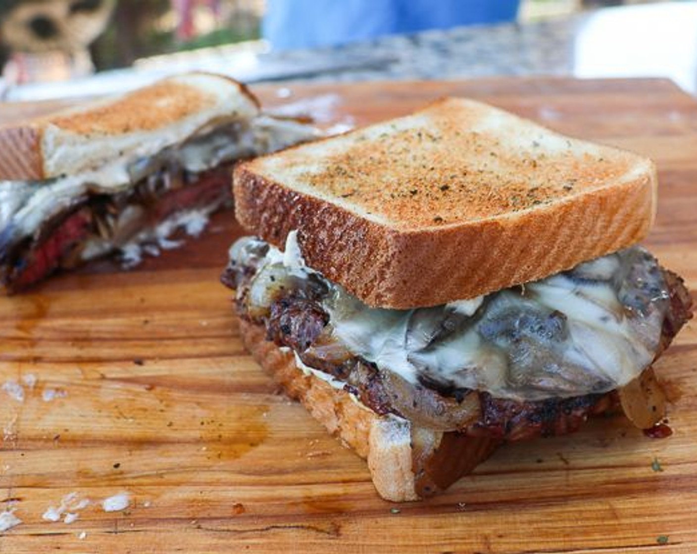 step 11 Slather each piece of Texas Garlic Toast with Roasted Garlic Mayo. Place steak on toast and top with the other slice.