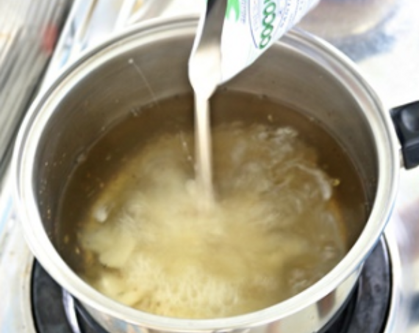 step 3 Pour in the Coconut Milk (1 cup), stir well and bring mixture to a boil again and off heat.