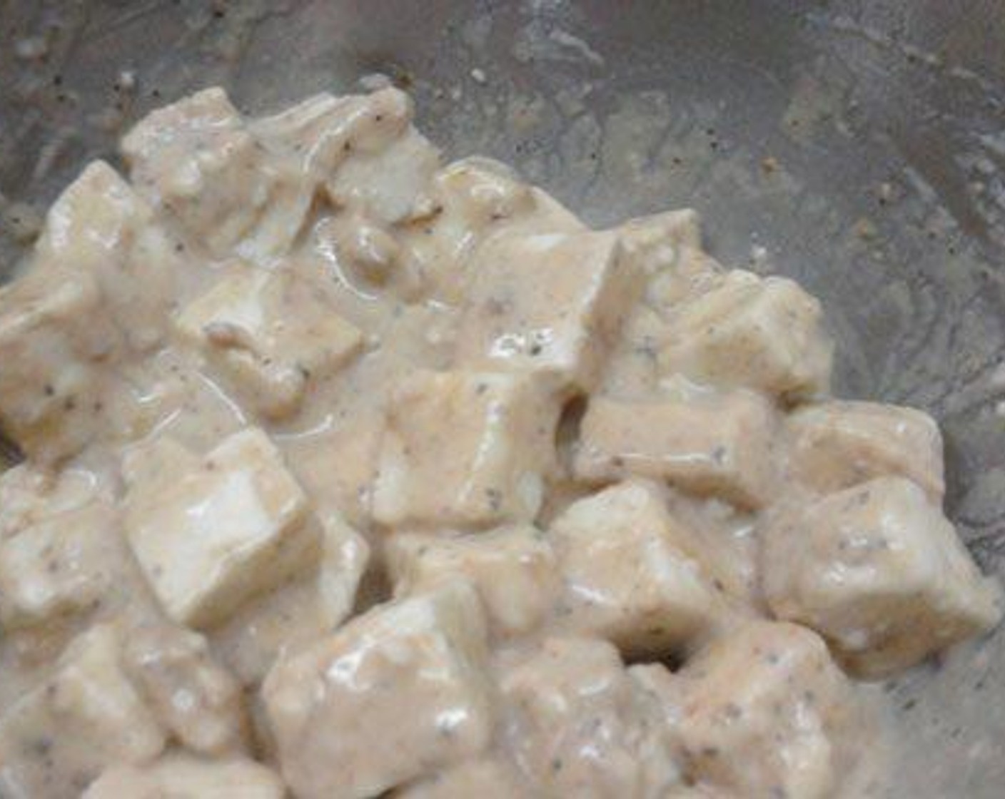 step 1 Marinate the Paneer (3/4 cup) cubes with Corn Flour (2 Tbsp), All-Purpose Flour (2 Tbsp), Soy Sauce (1/2 Tbsp), Ginger Garlic Paste (1 Tbsp), Ground Black Pepper (1/2 Tbsp), and Salt (to taste). Keep this for 10 to 15 minutes. Fry this in oil till it becomes golden brown in color.