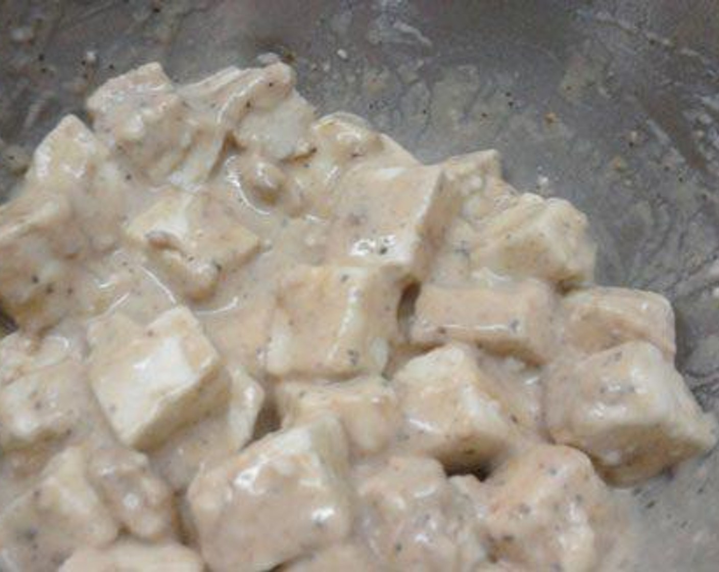 step 1 Marinate the Paneer (3/4 cup) cubes with Corn Flour (2 Tbsp), All-Purpose Flour (2 Tbsp), Soy Sauce (1 tsp), Ginger Garlic Paste (1 Tbsp), Ground Black Pepper (1 tsp), and Salt (to taste). Keep this for 10 to 15 minutes. Fry this in oil till it becomes golden brown in color.