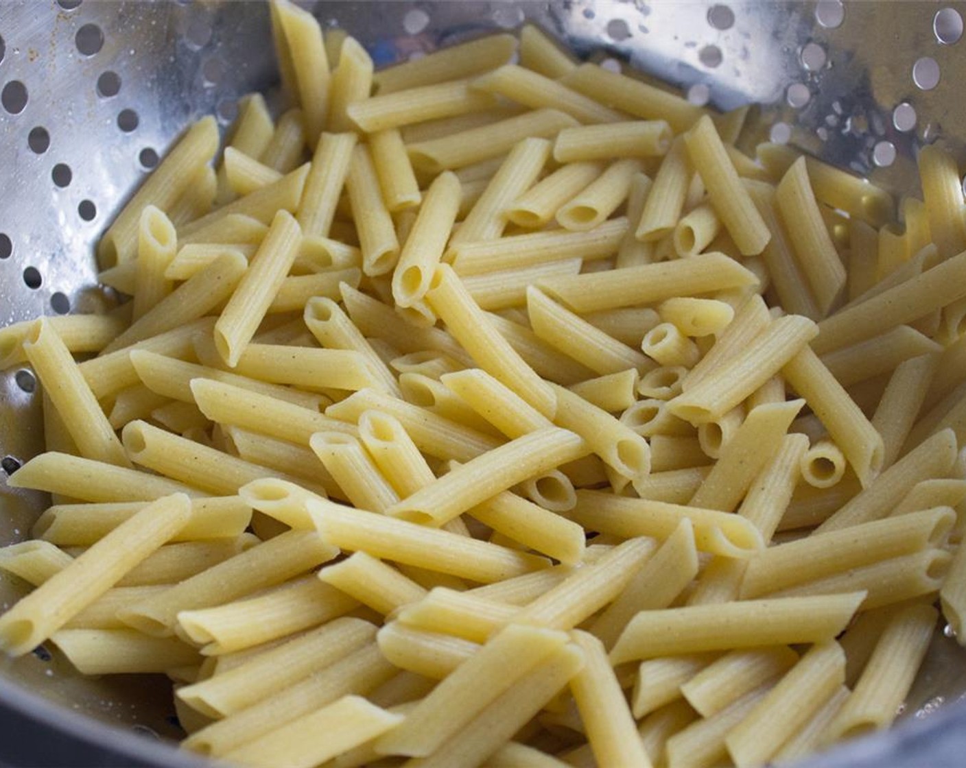 step 4 While vegetables are cooking, drain pasta and place back in a large pot at medium heat. Stir in Greek Yogurt (2/3 cup), and a 1/2 cup each of grated Parmesan and gouda cheeses. Add Salt (to taste) and Ground Black Pepper (to taste).