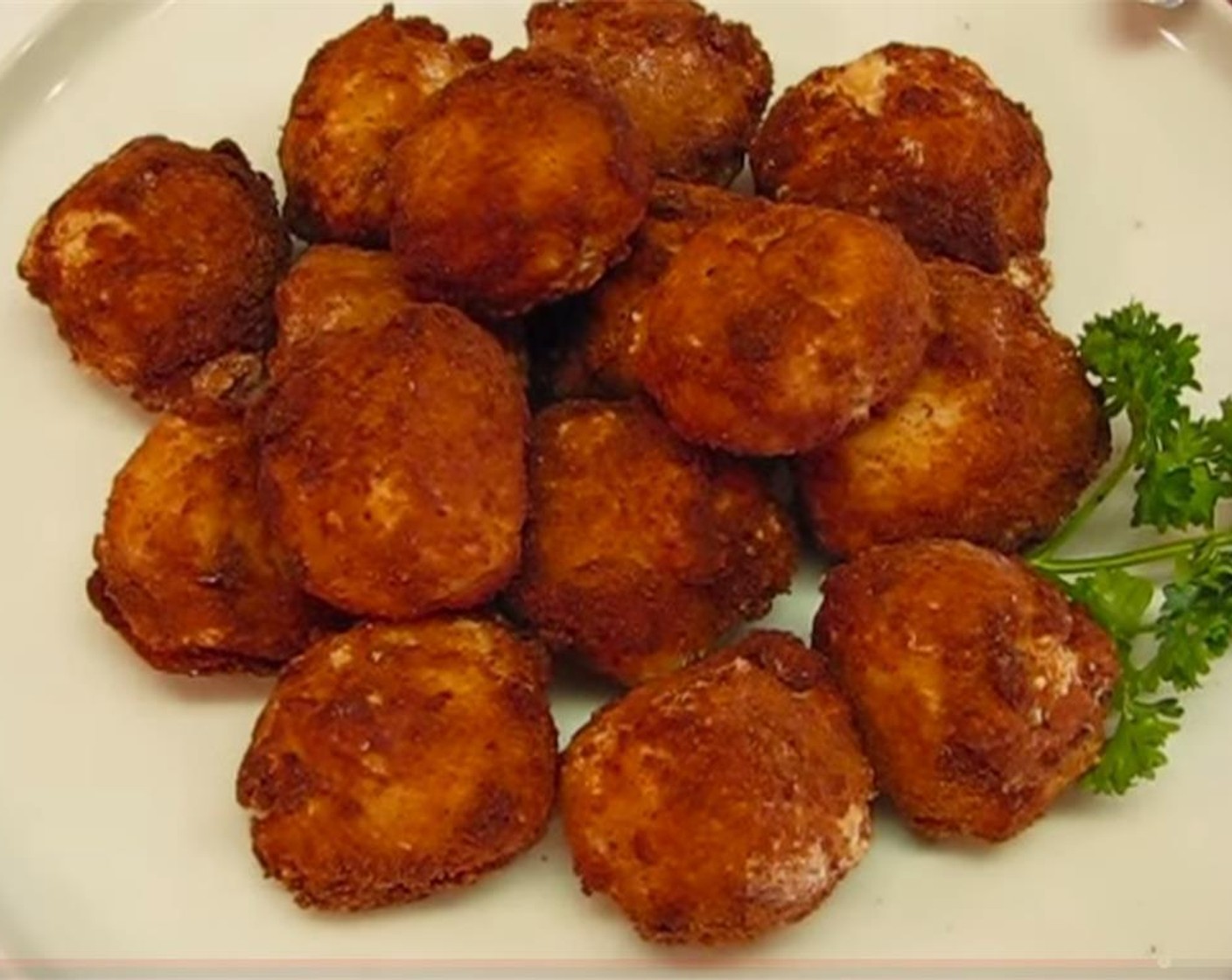 step 10 Transfer the drained mashed potato balls to a nice serving plate, and garnish with Fresh Parsley (1 sprig). Serve immediately, because they are best when hot!