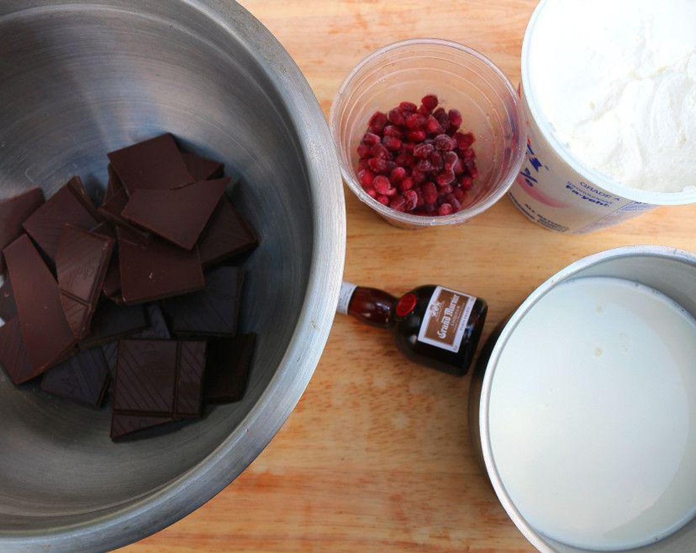 step 1 Place the 70% Dark Chocolate (1 cup) into a medium heatproof bowl. In a small heavy-bottomed saucepan, bring the Whole Milk (1/2 cup) just to a boil over medium heat.