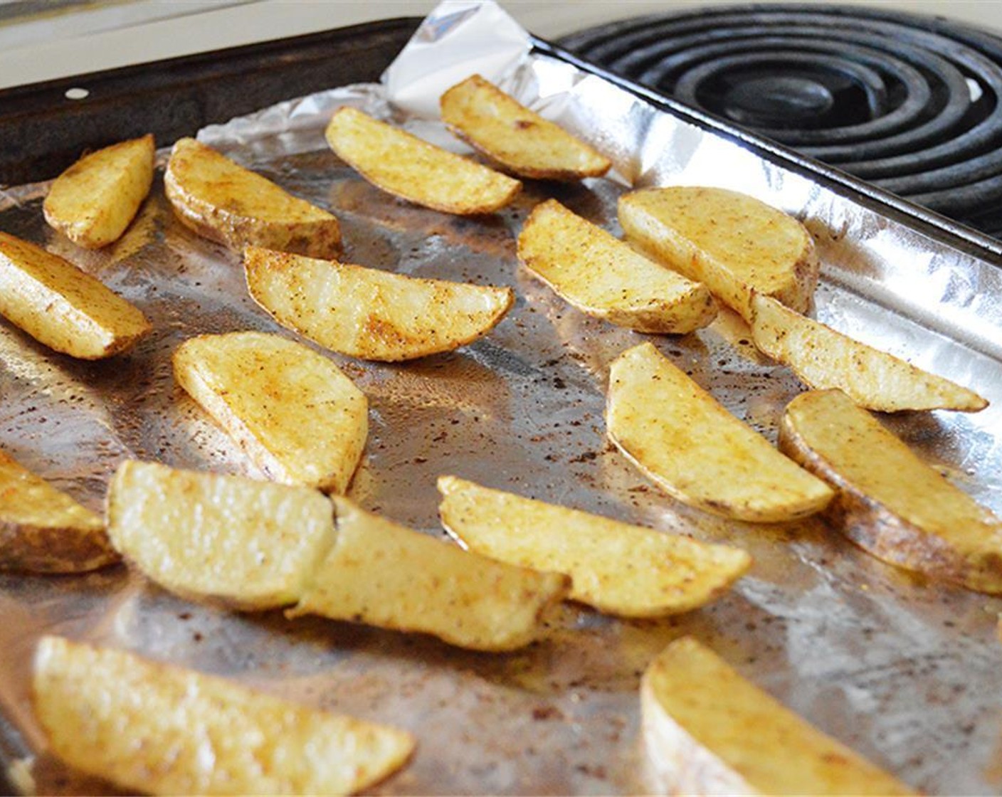 step 3 Spread wedges on a lined and greased baking sheet. Bake at 400 degrees F (200 degrees C) for 15-20 minutes or until fries are soft.